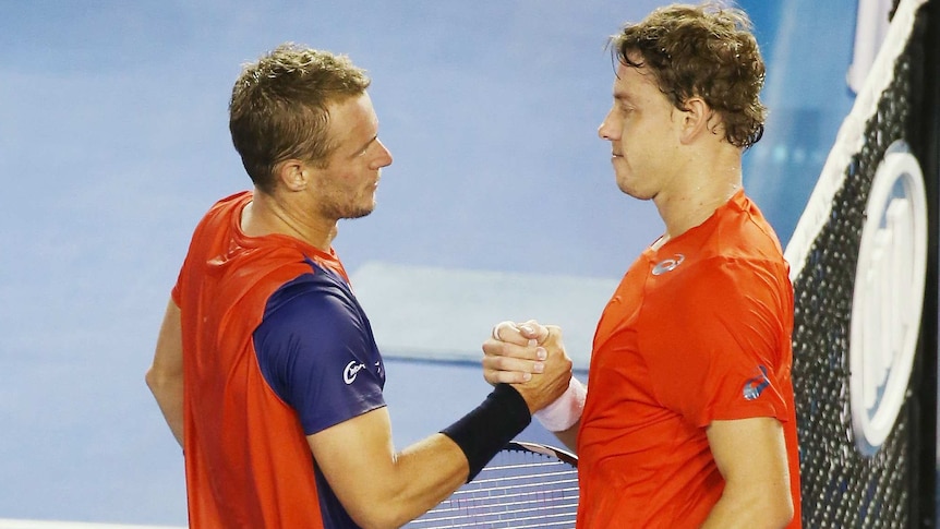 Australia's Lleyton Hewitt shakes hands with James Duckworth after their 2016 Australian Open match.