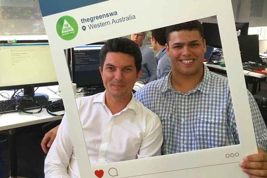 Jordon Steele-John (right), a Greens senate candidate, poses for a photo with former senator Scott Ludlam.