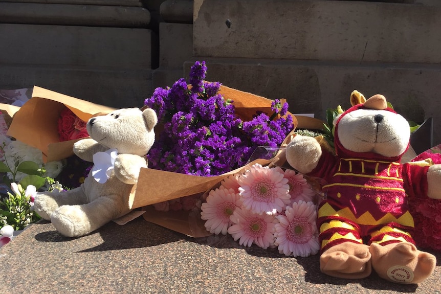 Flowers laid on Bourke St