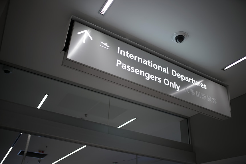 A sign for international departure passengers at Adelaide Airport. 