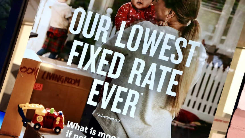 An advertisement in an unidentifiable bank window saying "Our lowest fixed rate ever".