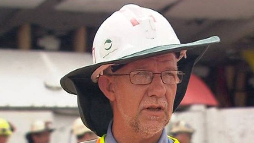 Generic TV still of Queensland Resources Council ceo Michael Roche wearing a hard hat.
