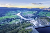 An aerial photo of the snowy mountain hydro-electric complex at dusk.