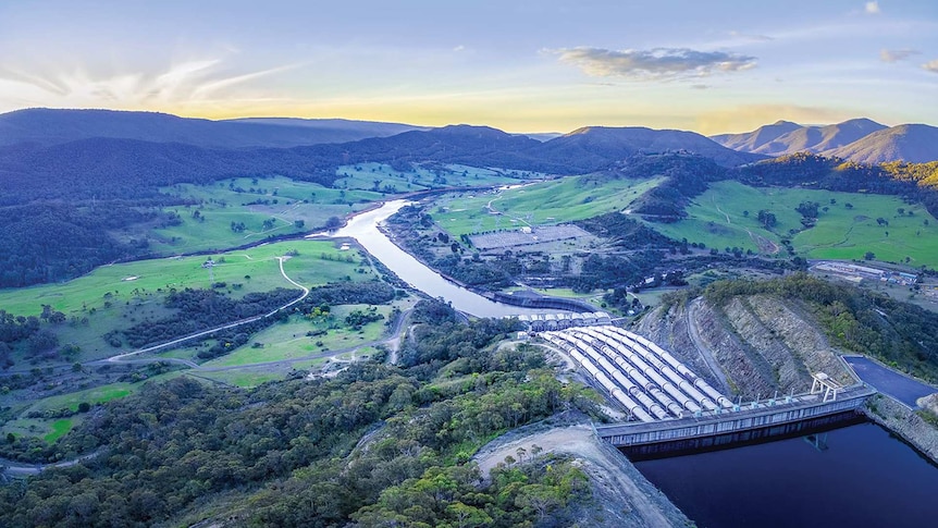 An aerial photo of the snowy mountain hydro-electric complex at dusk.