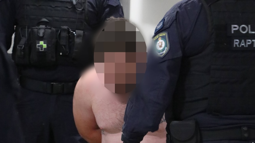 A topless man with his face blurred out surrounding by police detectives.