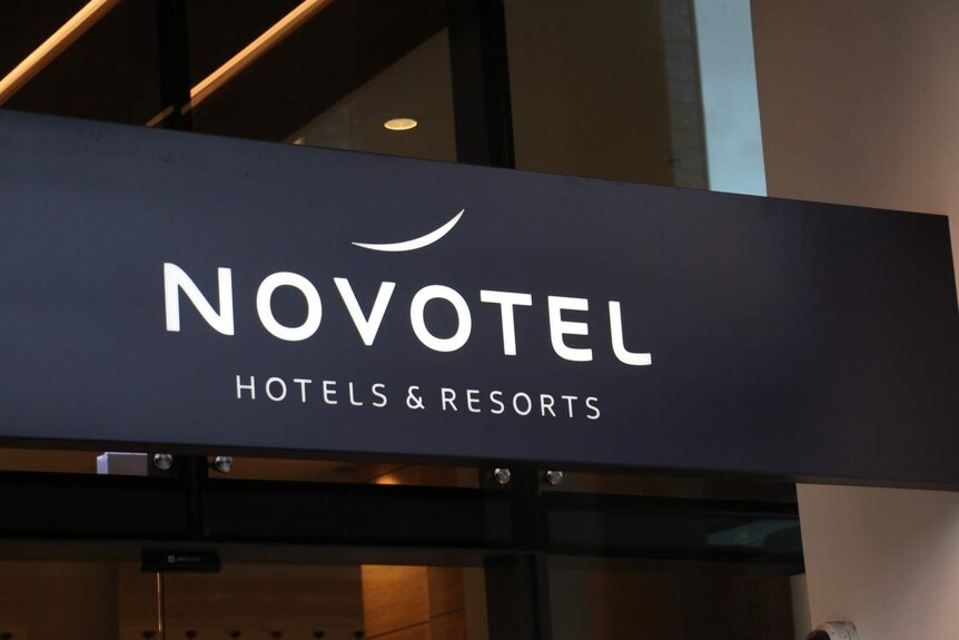 A close up of the sign on the entry to the Novotel Hotel in Perth.