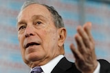 Michael Bloomberg gestures.