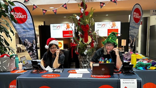 ABC employees answer phones at 2023 ABC Giving Tree Appeal Giveathon