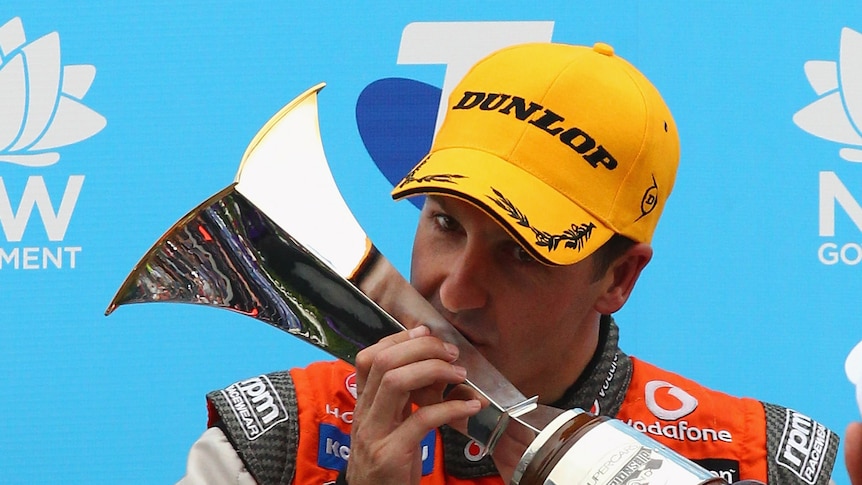 To the victor ... Jamie Whincup celebrates his championship win (Robert Cianflone: Getty Images)