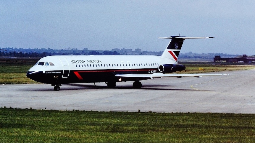 A jet airliner with British Airways branding sits on the tarmac