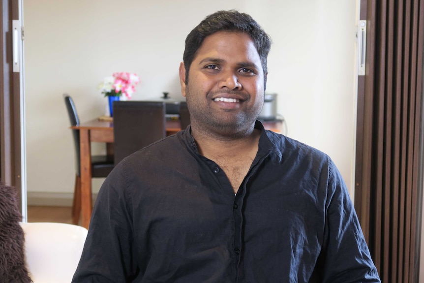 Mohan Mattala in his lounge room.