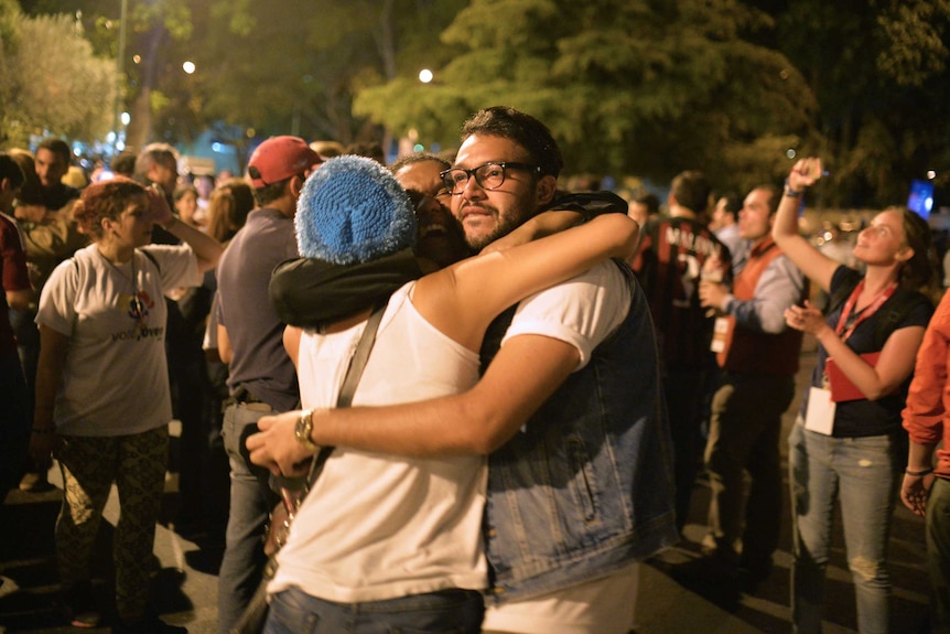 Venezuelan opposition supporters celebrate.