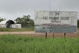 A sign for a fire training ground near Tindal Airforce base warning of hazardous material.