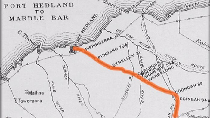 Black and white map with train route from Marble Bar to Port Hedland outlined in orange.
