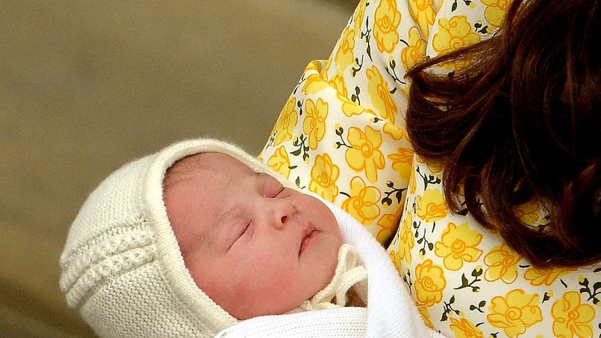Catherine, Duchess of Cambridge, holds her newly-born daughter