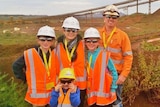 Robina Haines with her late husband and children on a mine site in Western Australia.