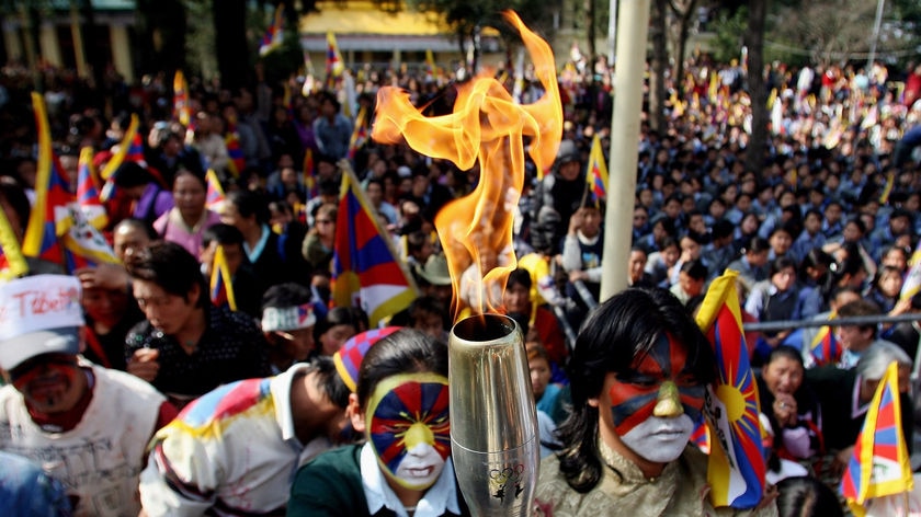 Tibetan activists brandish Olympic flame