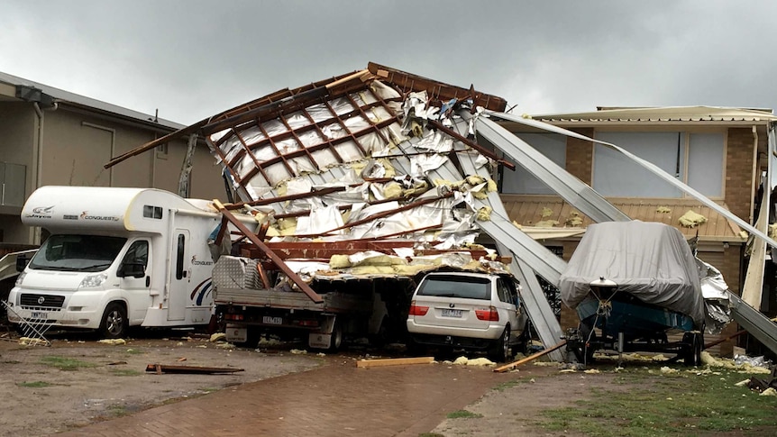 Roof blown onto neighbour's house at Aspendale, in Melbourne