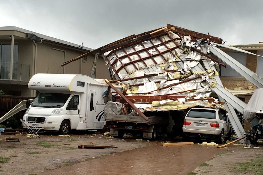 Roof blown onto neighbour's house at Aspendale, in Melbourne