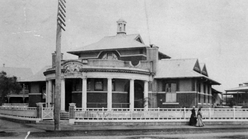 A black and white photo of a historic building in Mackay, Queensland.