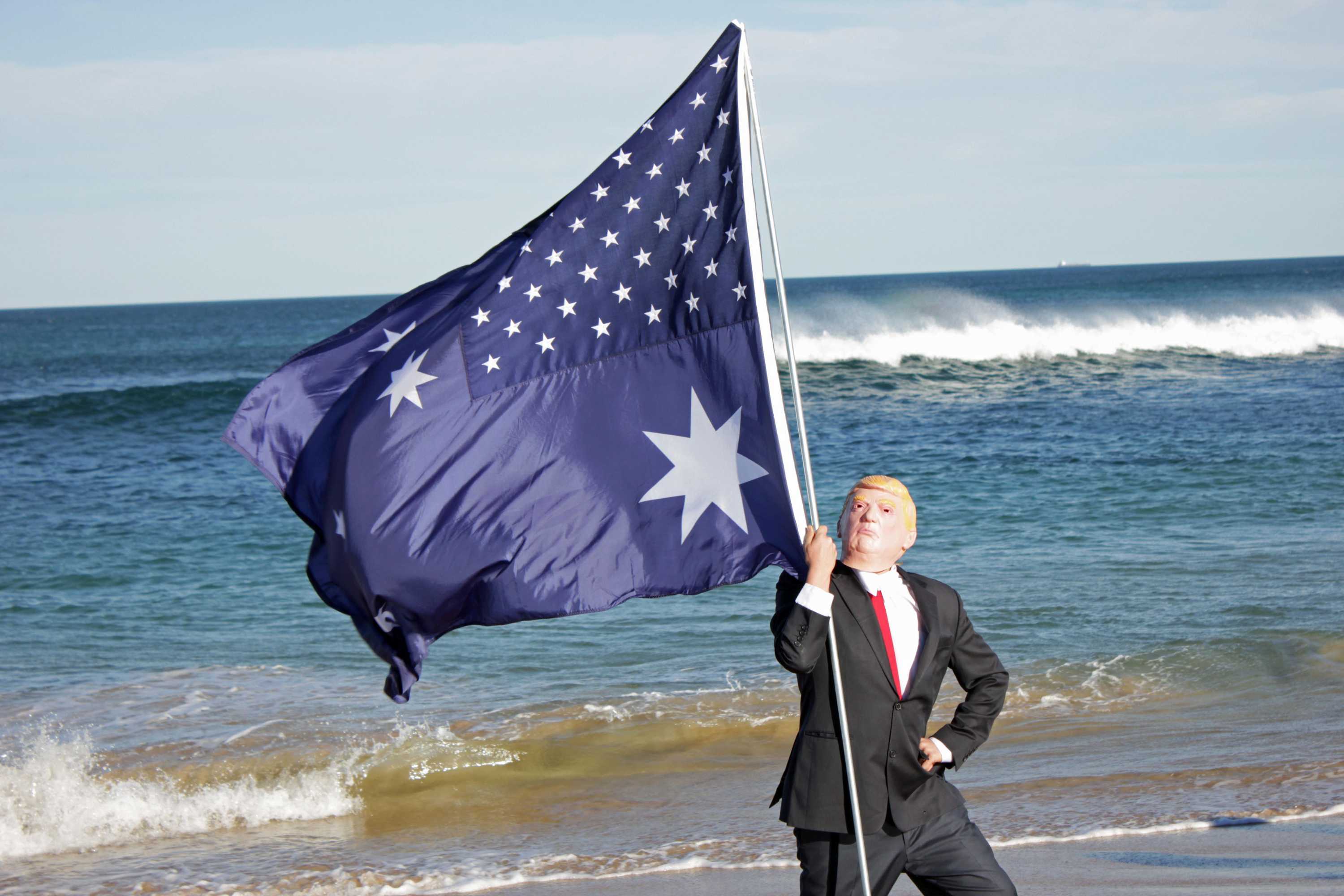 Donald Trump impersonators washed off Newcastle beach during satirical press conference - ABC News