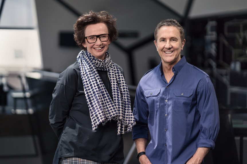 Virginia Lovett and Brett Sheehy standing side by side smiling at camera.