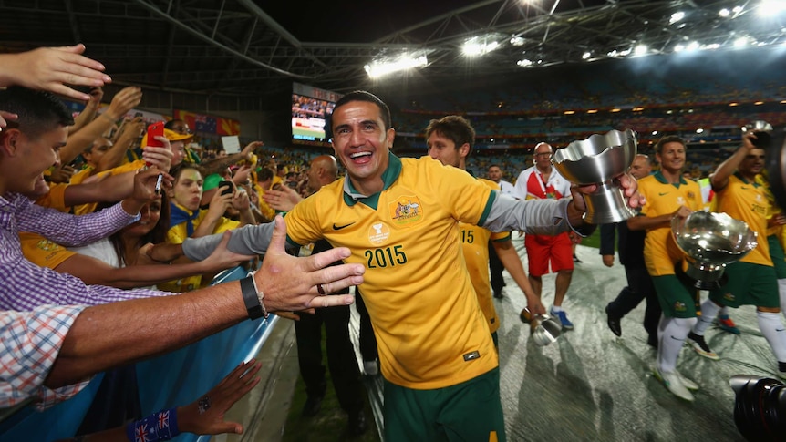 Cahill celebrates with fans after Asian Cup triumph