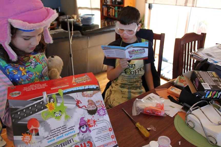 Ingrid McCarthy's two children exploring science as part of their home education.