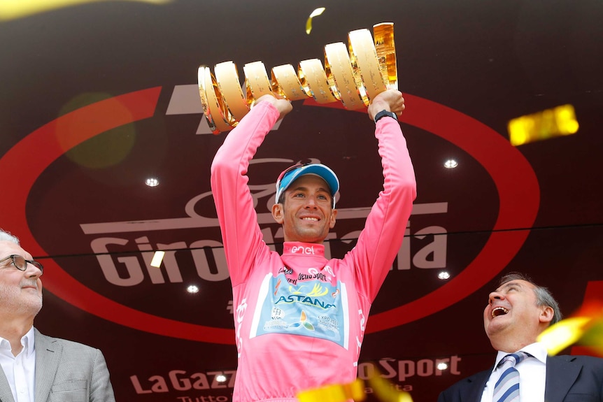 Vincenzo Nibali holds aloft the Giro d'Italia trophy