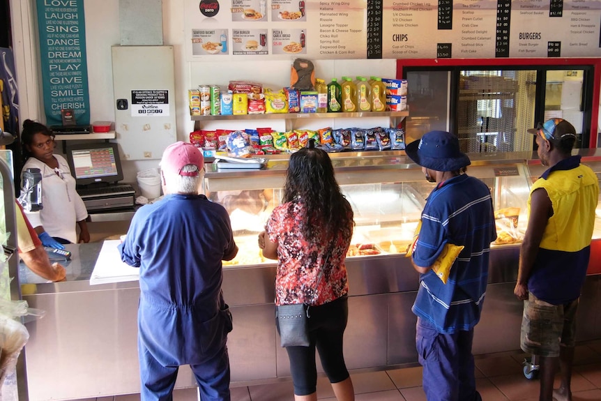 Palm Island's busy fish and chip shop is one of the few retail options available.