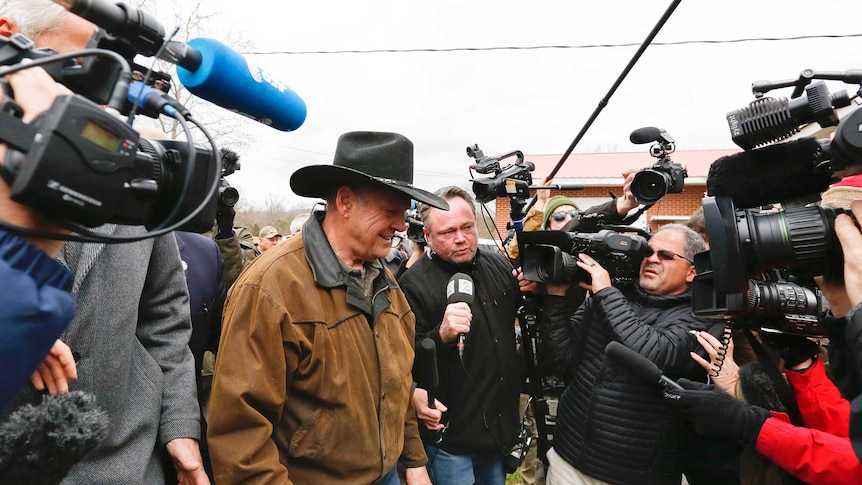 Republican Roy Moore said riding his horse to the polls would bring him luck (Photo: AP/Brynn Anderson)