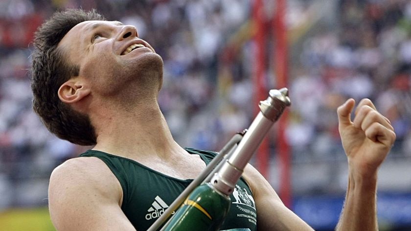 Australia's Heath Francis celebrates after winning the men's 100m T46 final
