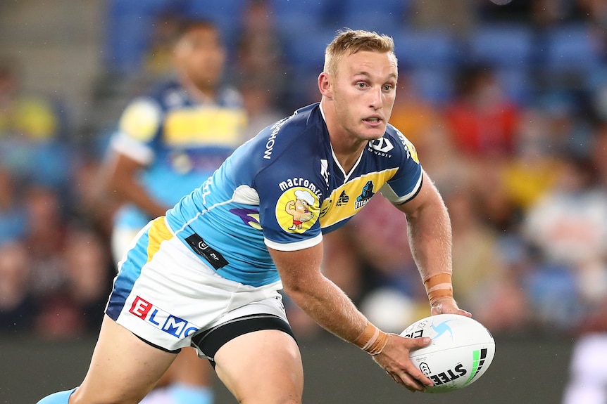 Tanah Boyd of the Gold Coast Titans passes the ball