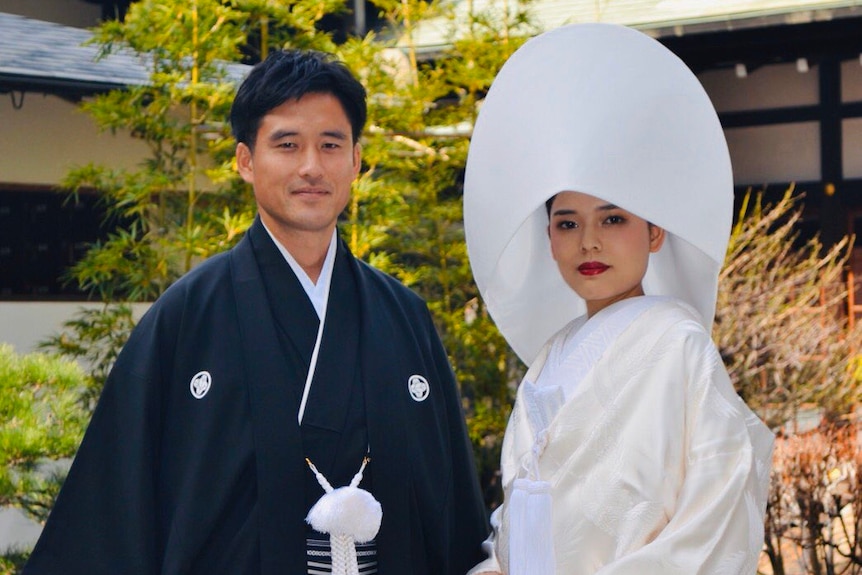 A man and a woman on their wedding day in Japan