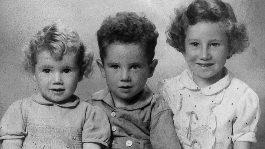 Michael Kent as a young boy with his sisters