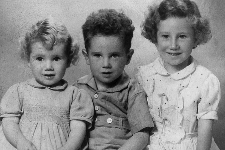 Michael Kent as a young boy with his sisters