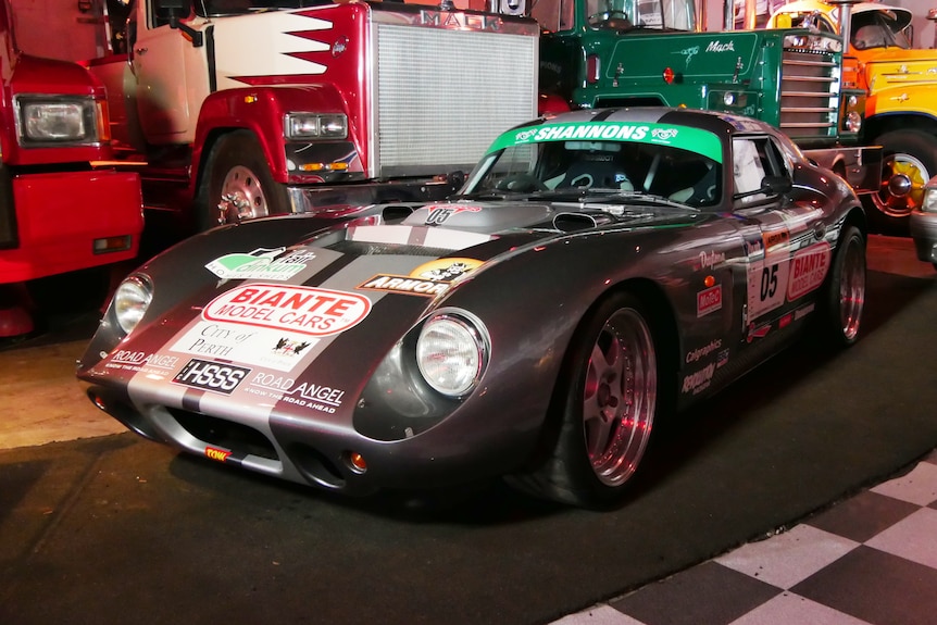 A race car, a Daytona Coupe, sits in Peter Champion's collection of Peter Brock race cars.