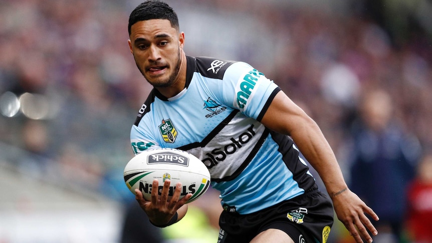 Valentine Holmes carries the ball