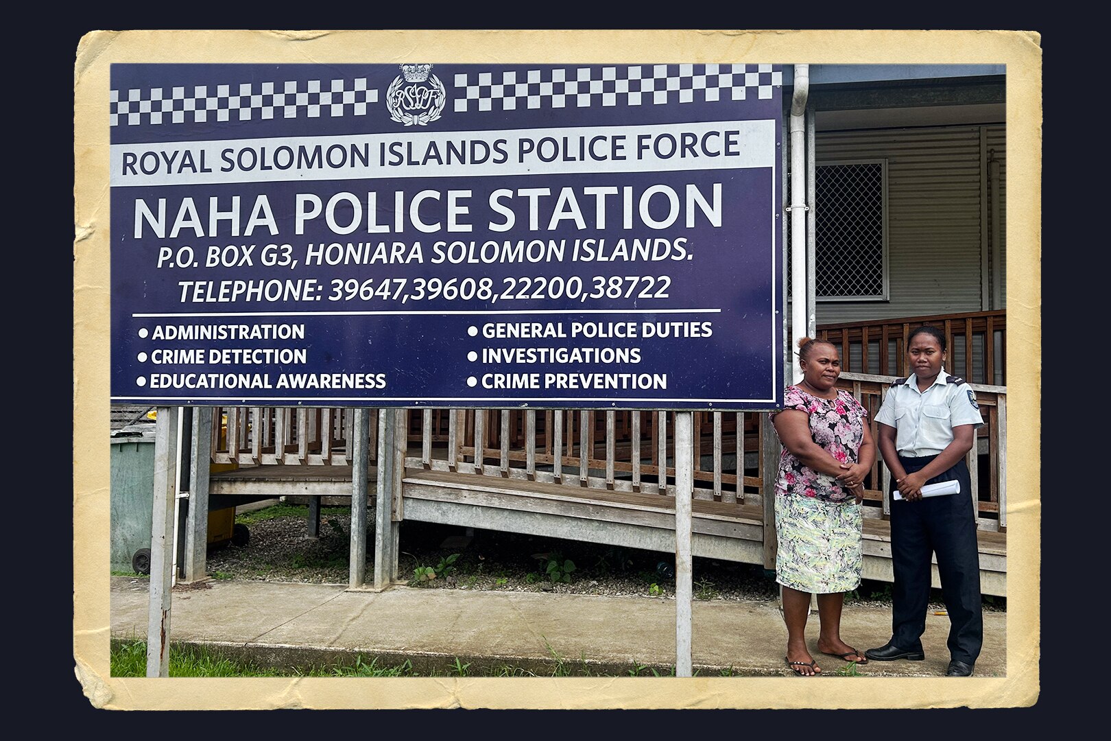 A photo of Constable Leah Adi (left) and Harriet Maeva (right) outside Naha Police Station.