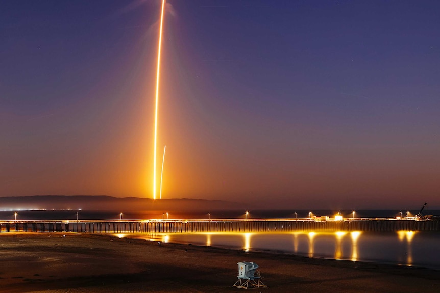 Two streaks of light in the sky.