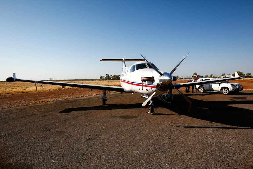RFDS aircraft on an outback runway.