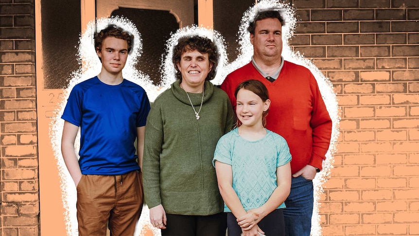 Father Vaughn Bennison, mother Emma, son Julian and daughter Lucy standing in front of home to depict parenting with disability.