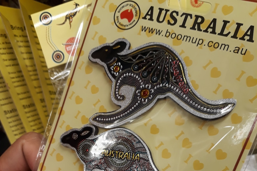 Kangaroo shaped magnets with Indigenous designs.
