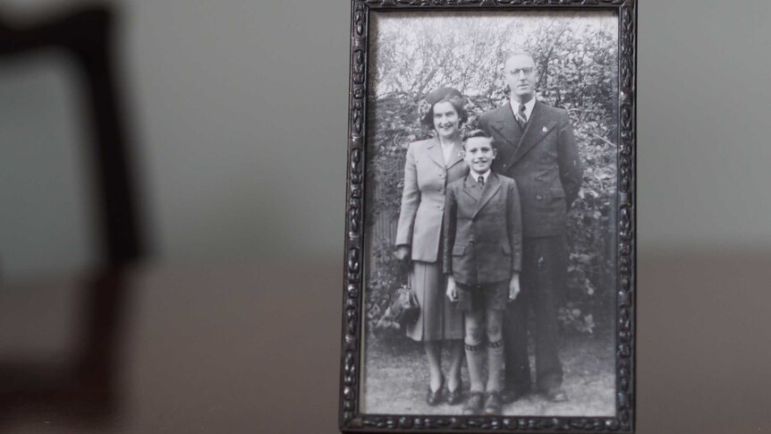 A framed photo of the Corey family after World War II