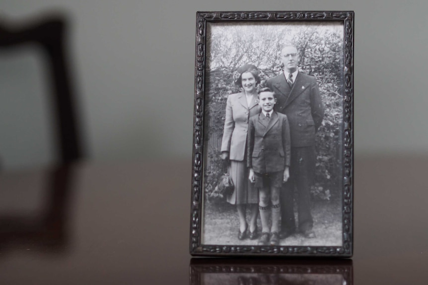 A framed photo of the Corey family after World War II