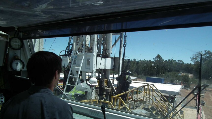 Workers at Santos' Dewhurst 8A well, Pilliga State Forest, NSW