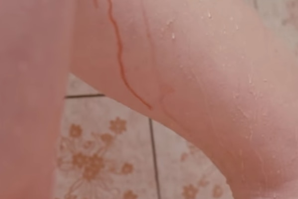 Still from Bodyform advertisement showing woman's leg