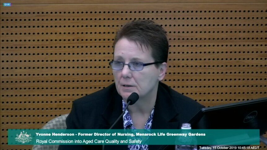 Yvonne Henderson speaks into a microphone during a hearing of the royal commission.