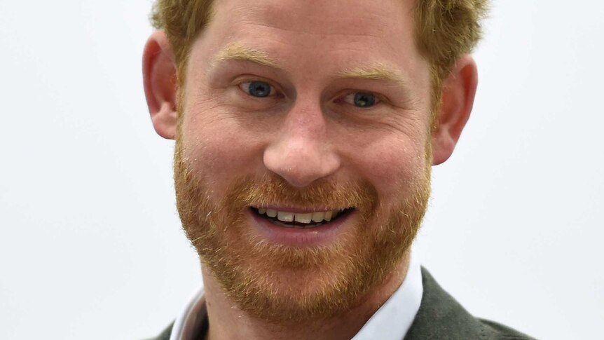 Prince Harry in a suit.
