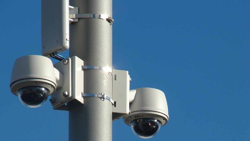 Close up of CCTV cameras on a lighting pole